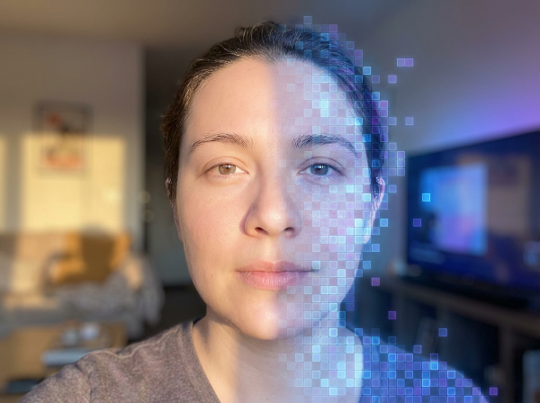 An image depicting a person's face split between natural light and digital pixels, symbolizing the integration of real-world identity and online presence.